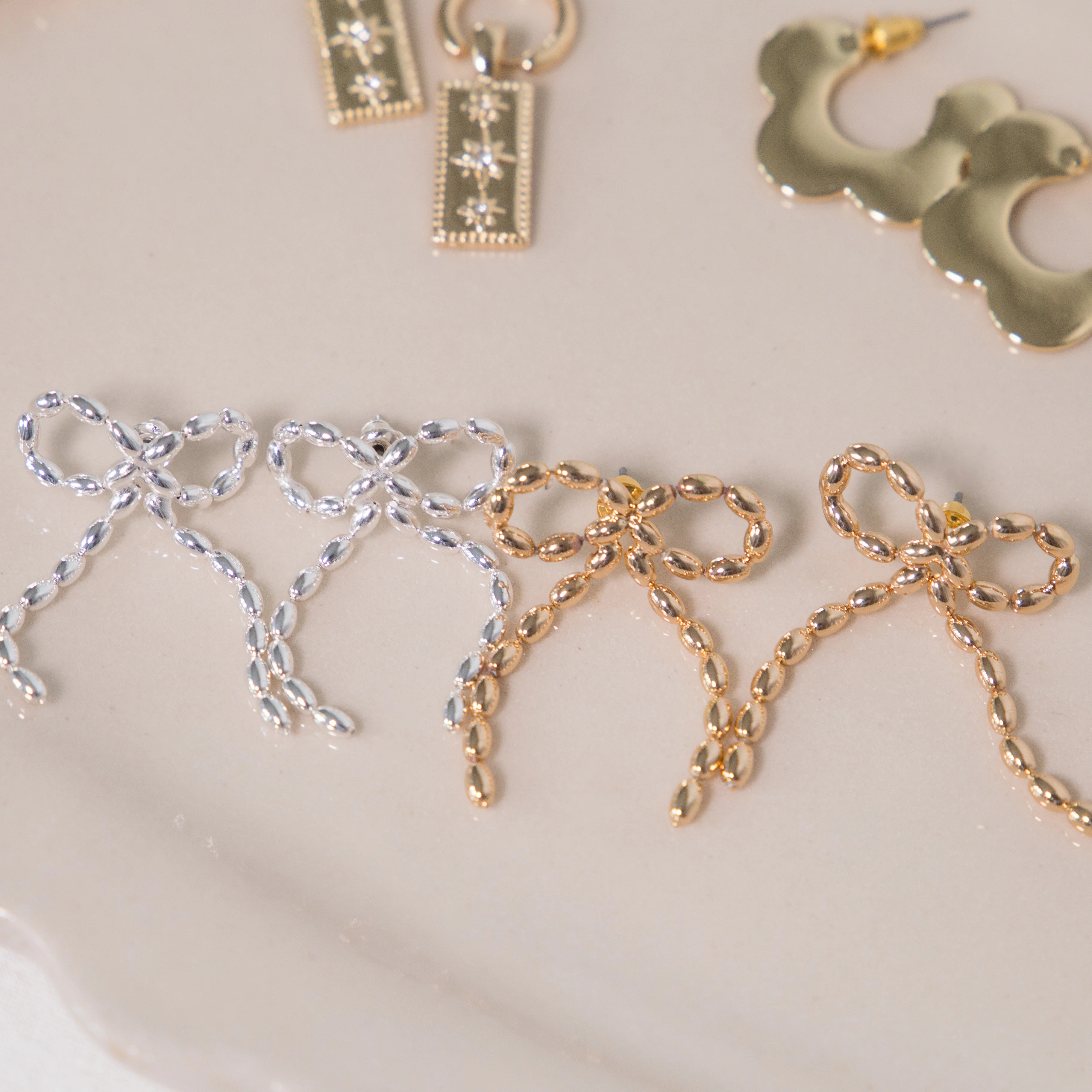 Big Metal London Celine Bow Dandle Stud Earrings in Silver or Gold Plated - Image 4