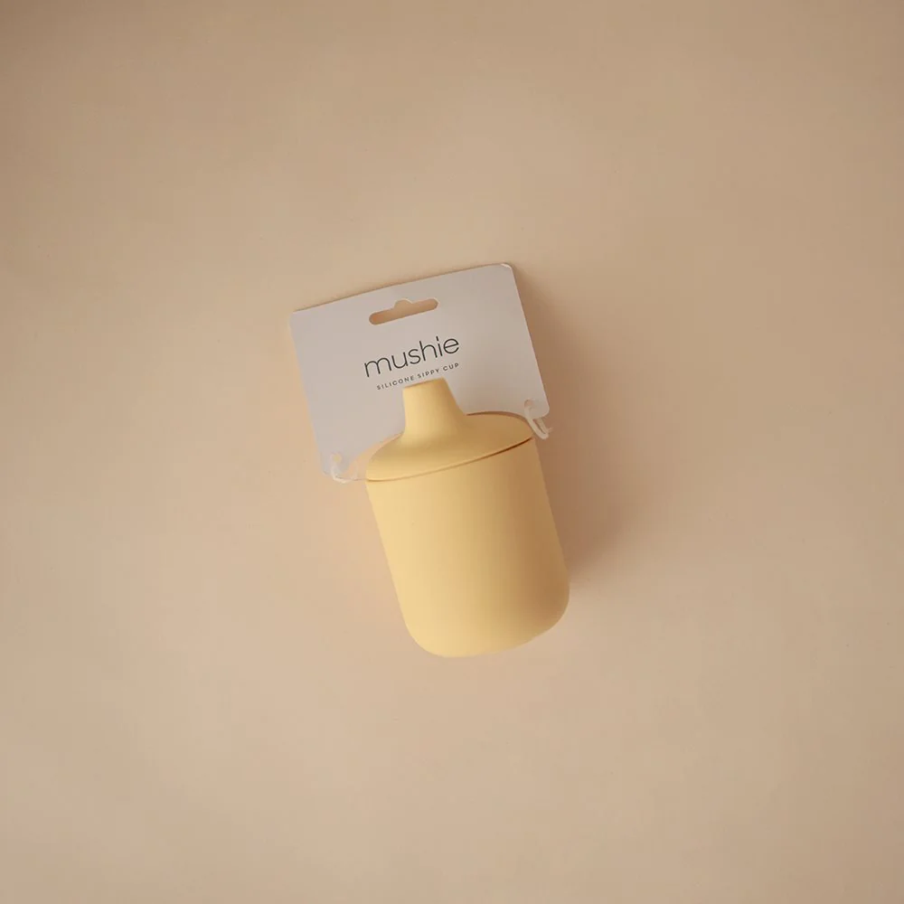 Mushie Silicone Sippy Cup in Pale Yellow - Image 4